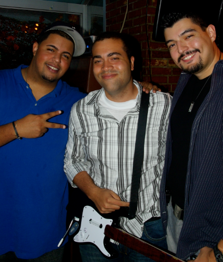 Harmonix's Caleb Epps with DualShockers Yaris Gutierrez (l) and Al Zamora (r)