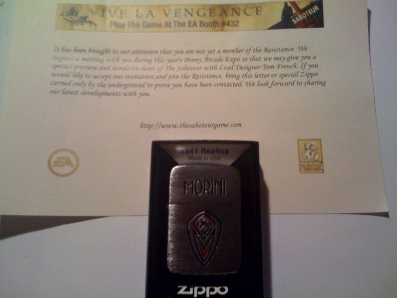 The Saboteur Zippo and letter