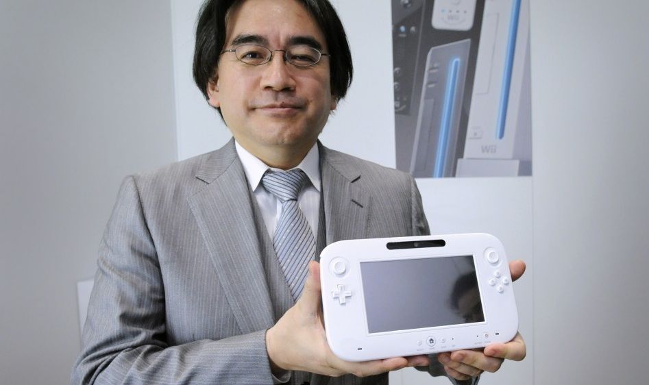 Nintendo Wii U held by Satoru Iwata