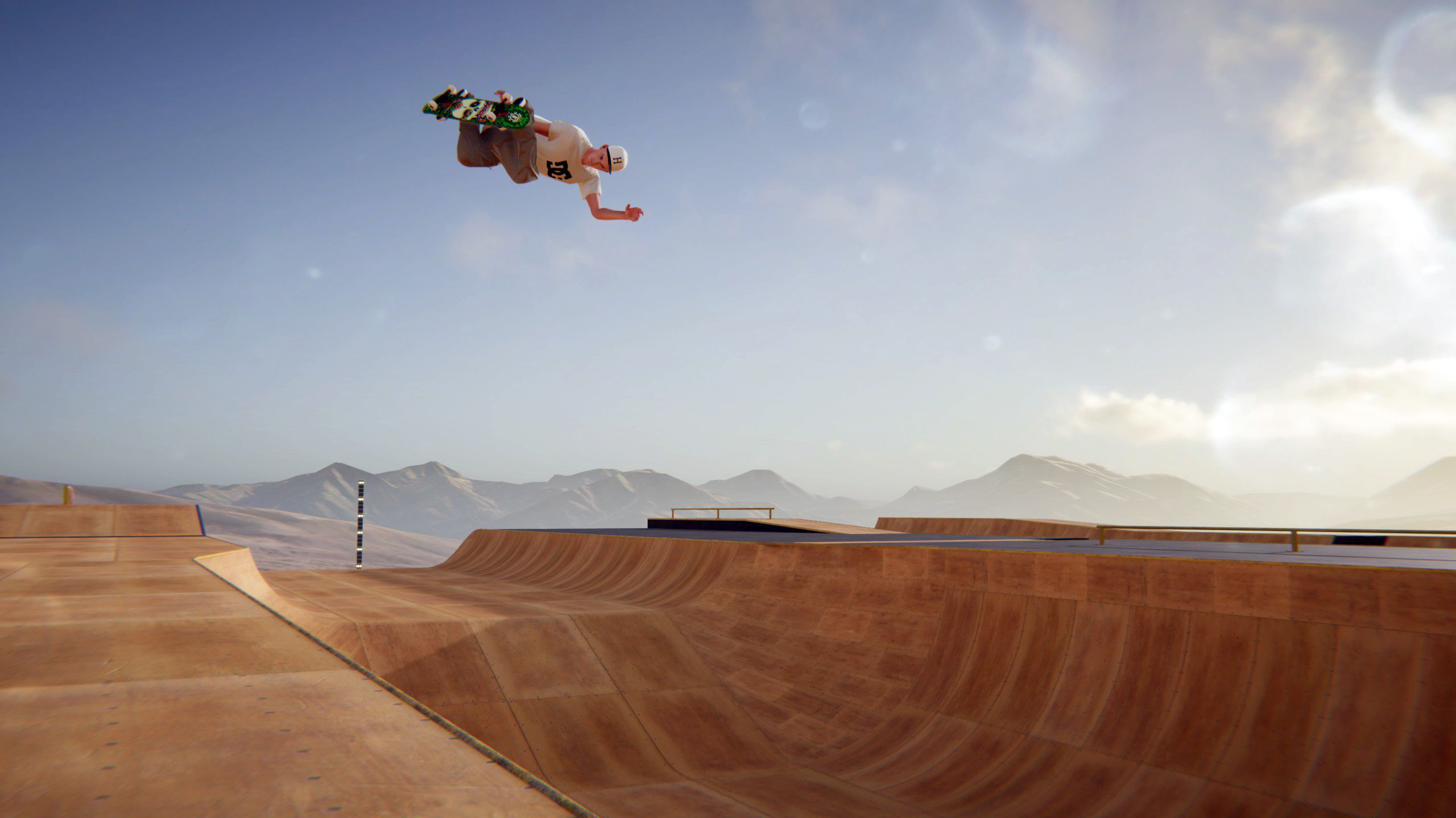 Skater XL player performing a grab above a vert