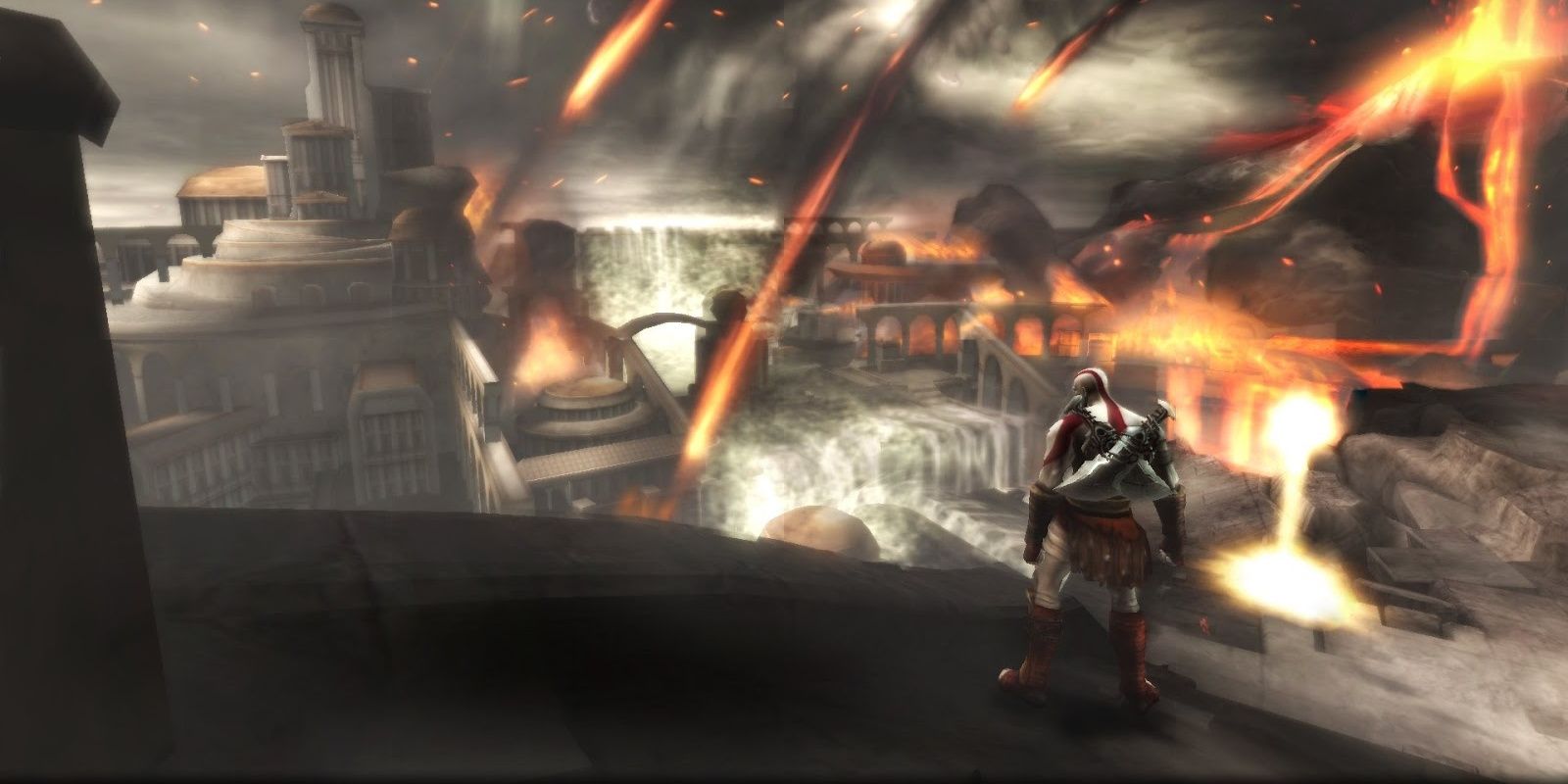 Kratos looks down at a city in ashes and flames as he looks for his brother Deimos.