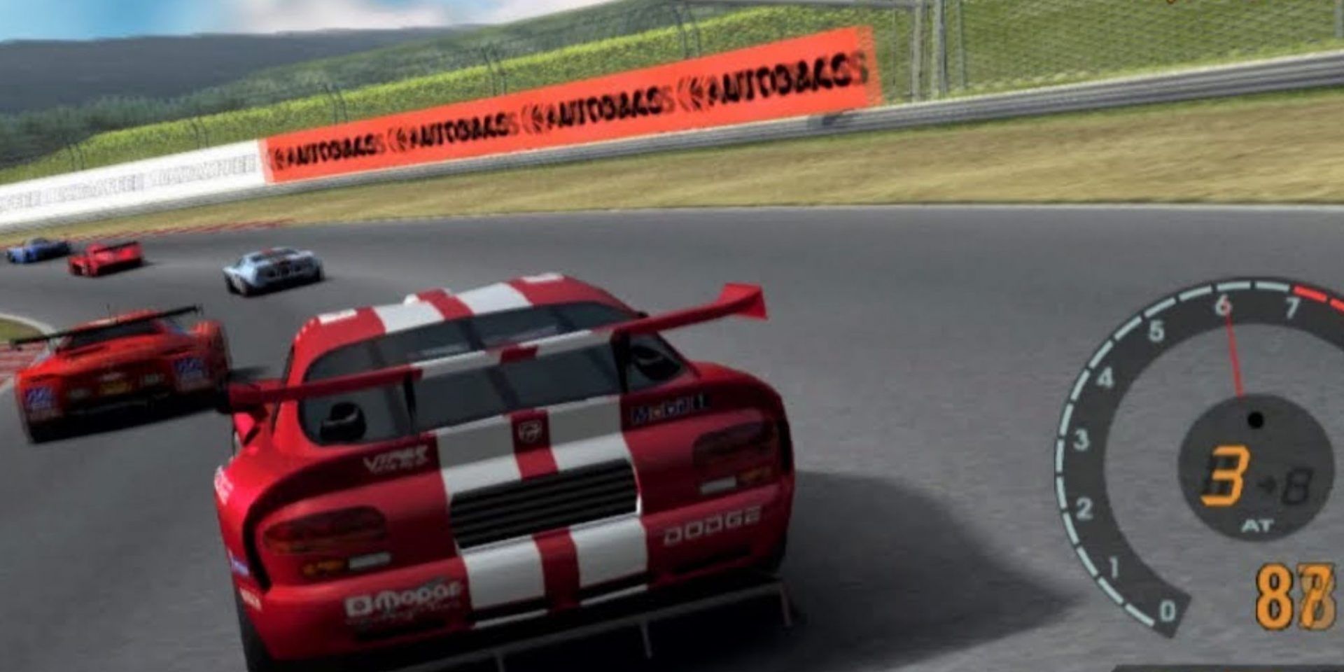 A Viper goes racing around a turn in third gear.