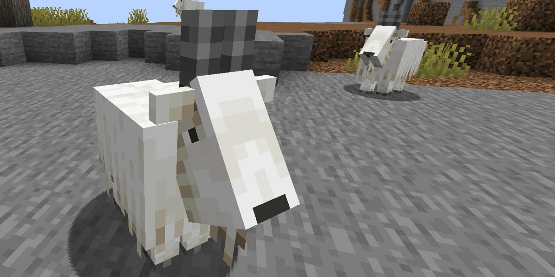 Minecraft - two goats on a mountain