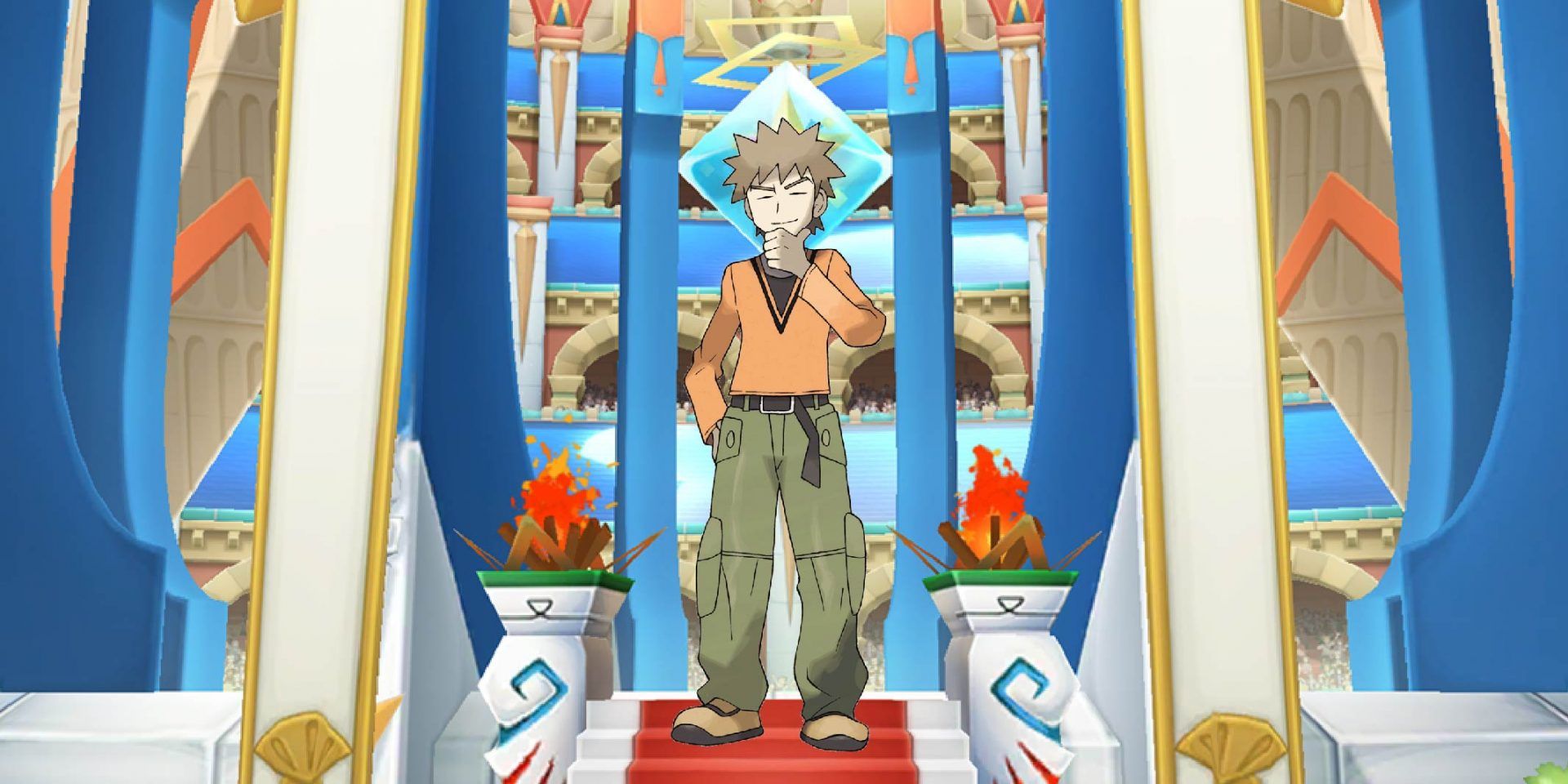 Brock from Pokémon standing against an arena backdrop.