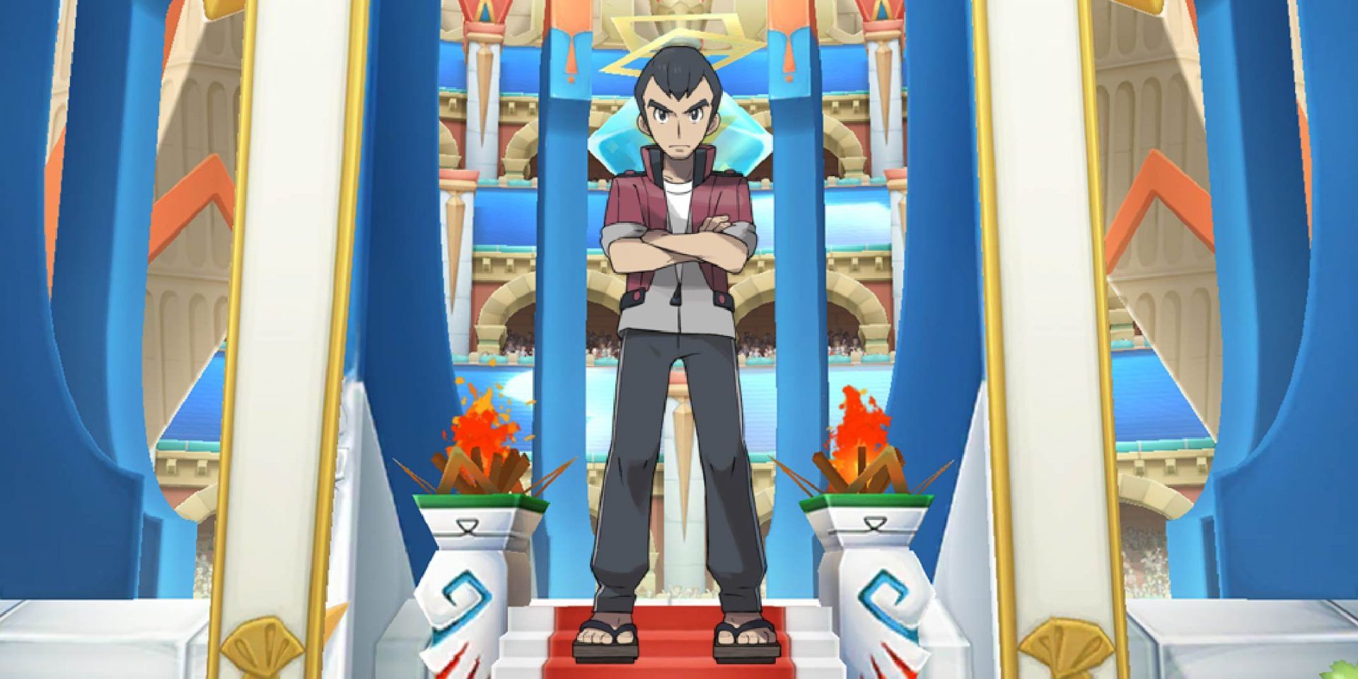 Norman from Pokémon standing against an arena backdrop.
