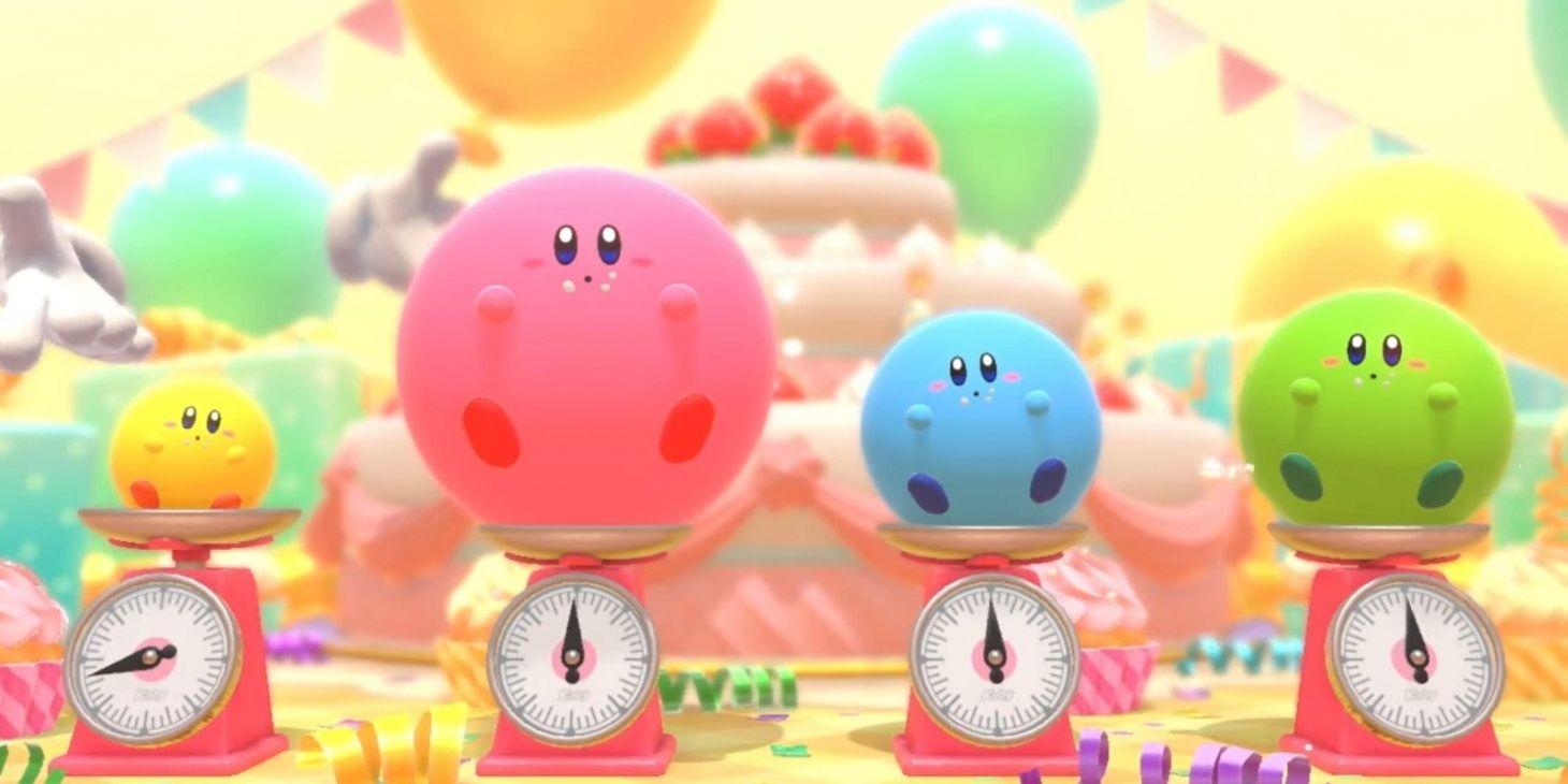 Kirbys of various size and colors on a weighing scale in Nintendo's Kirby's Dream Buffet official art
