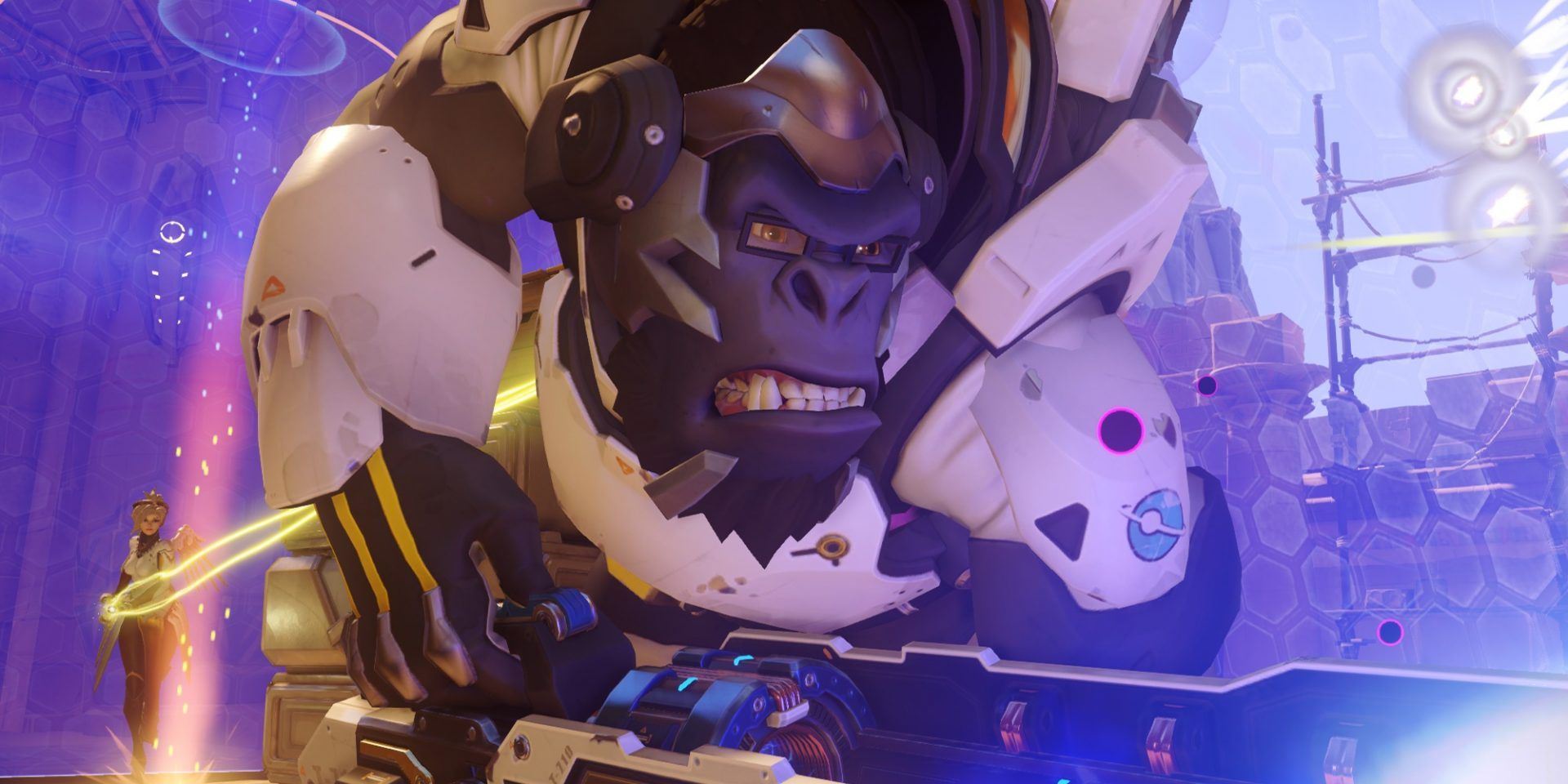 Winston protecting Mercy and using his shield