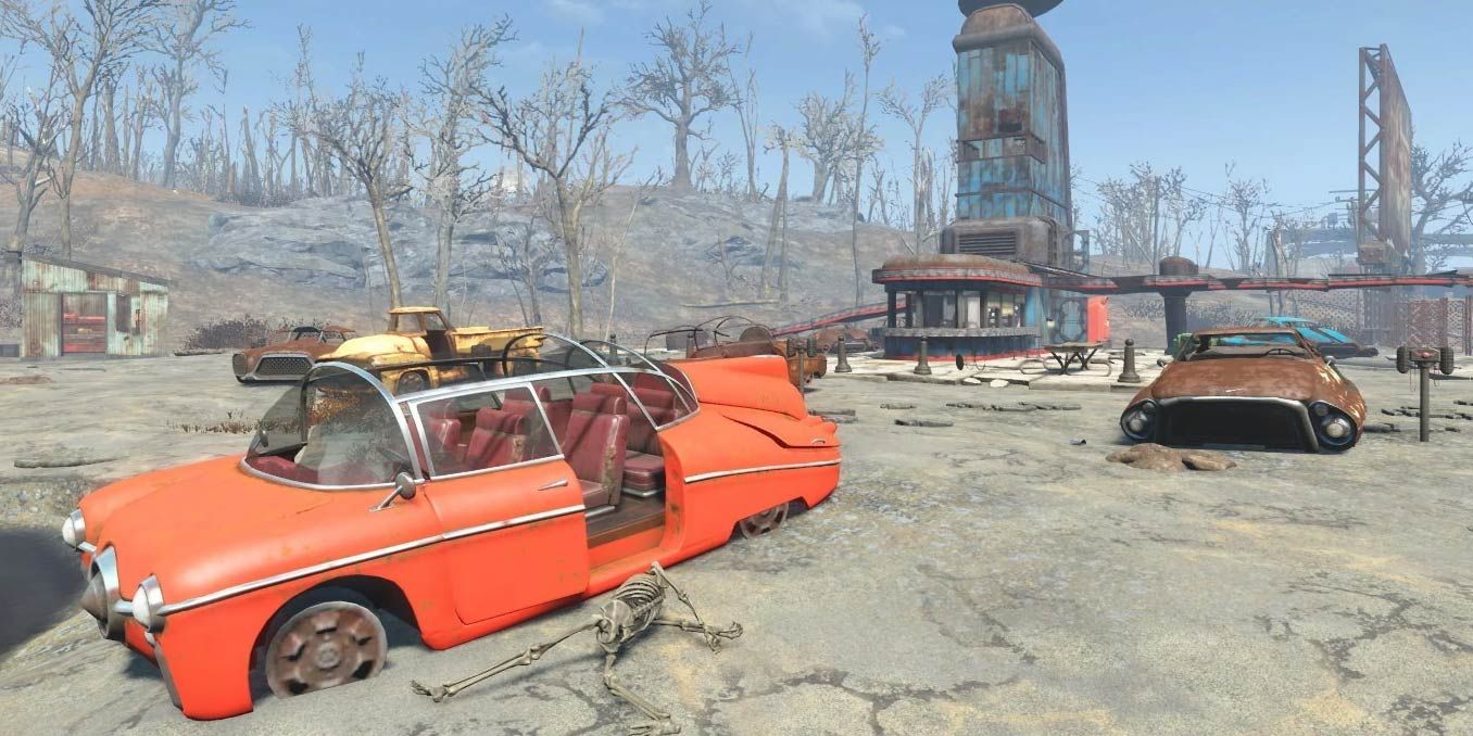 Starlight Drive-in in Fallout 4; broken-down cars in an empty lot.