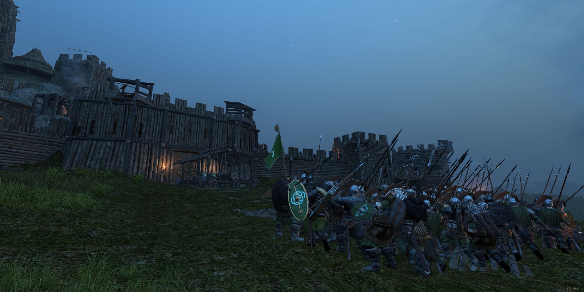 A group of soldiers advance on an enemy fortification in Mount & Blade Bannerlord