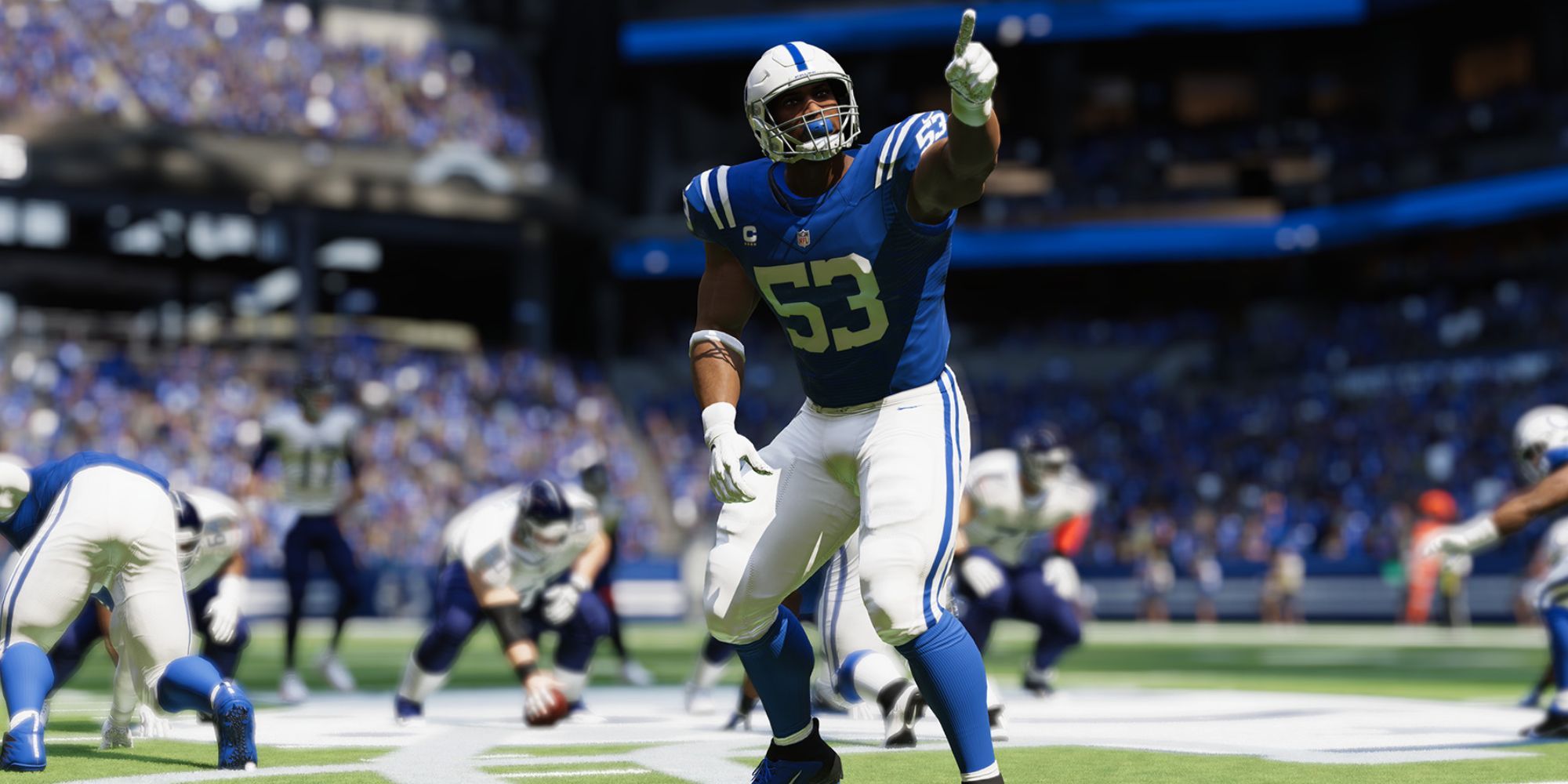 A player in Madden NFL 23 pointing 