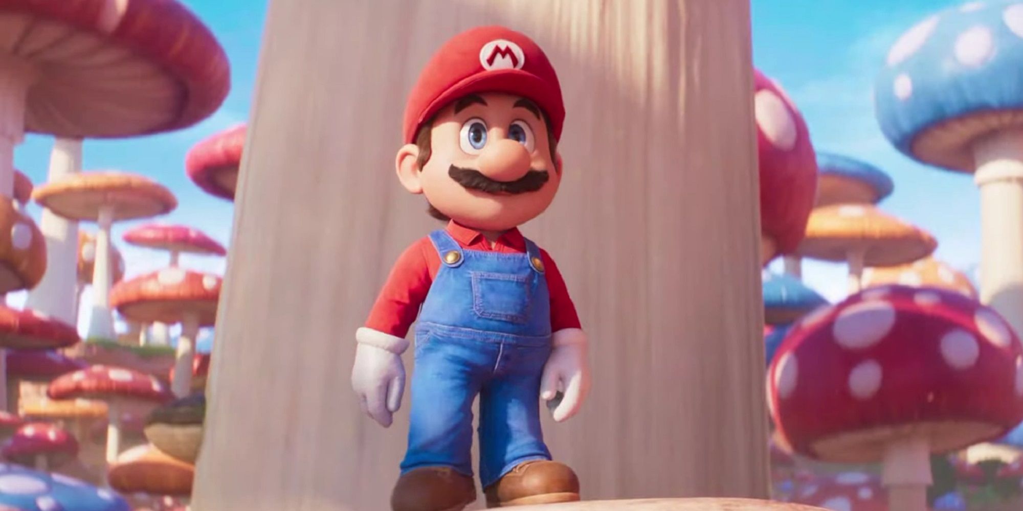 Mario Movie Mario Standing Wide-eyed In A Field Of Mushrooms