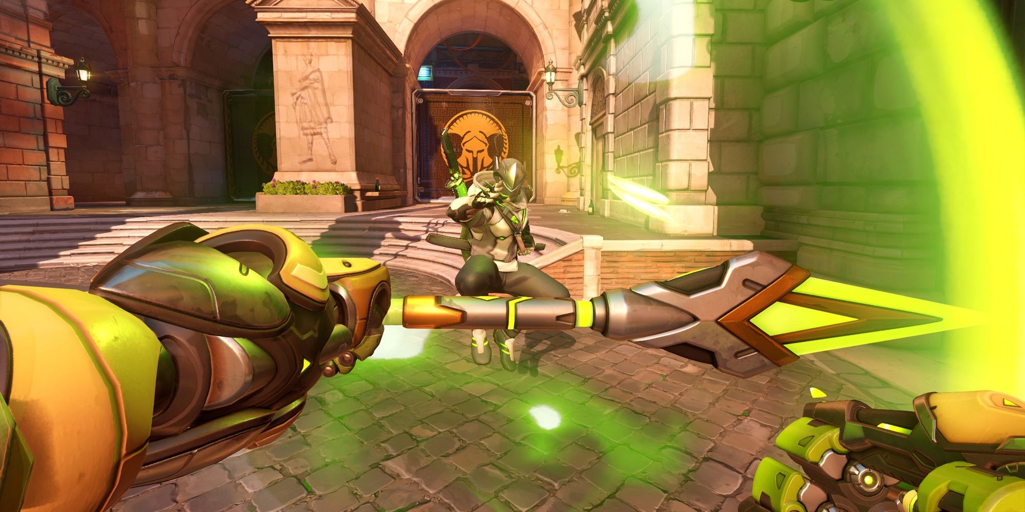 The first-person view of Orisa using her Javelin Spin ability to block Genji's attacks in Overwatch 2.