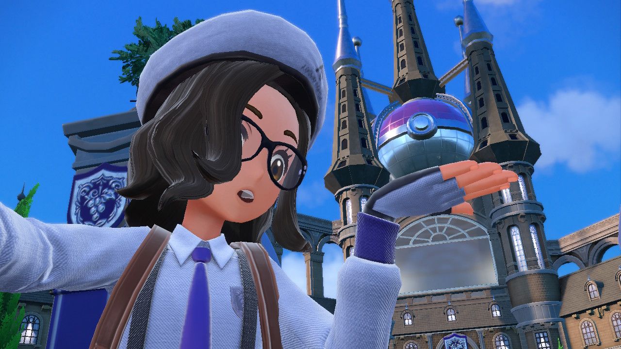Image shows Pokemon protagonist posing in front of Uva Academy.