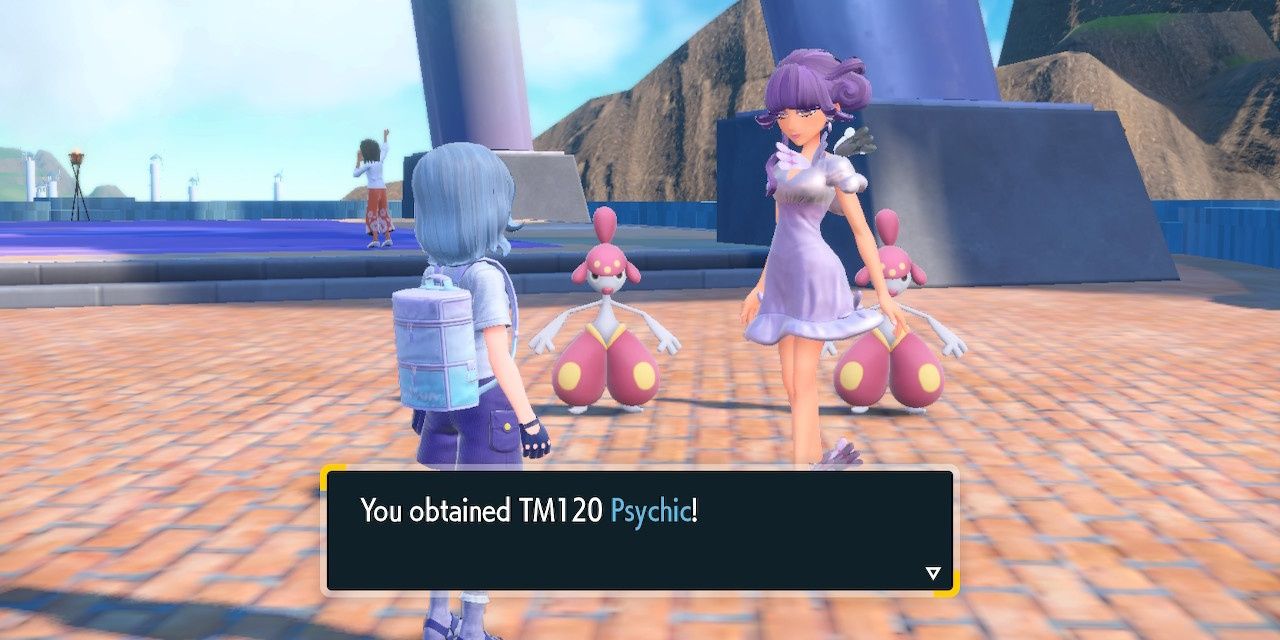 Image of the main character receiving a TM from Tulip of the Alfornada Gym in Pokemon Scarlet & Violet.