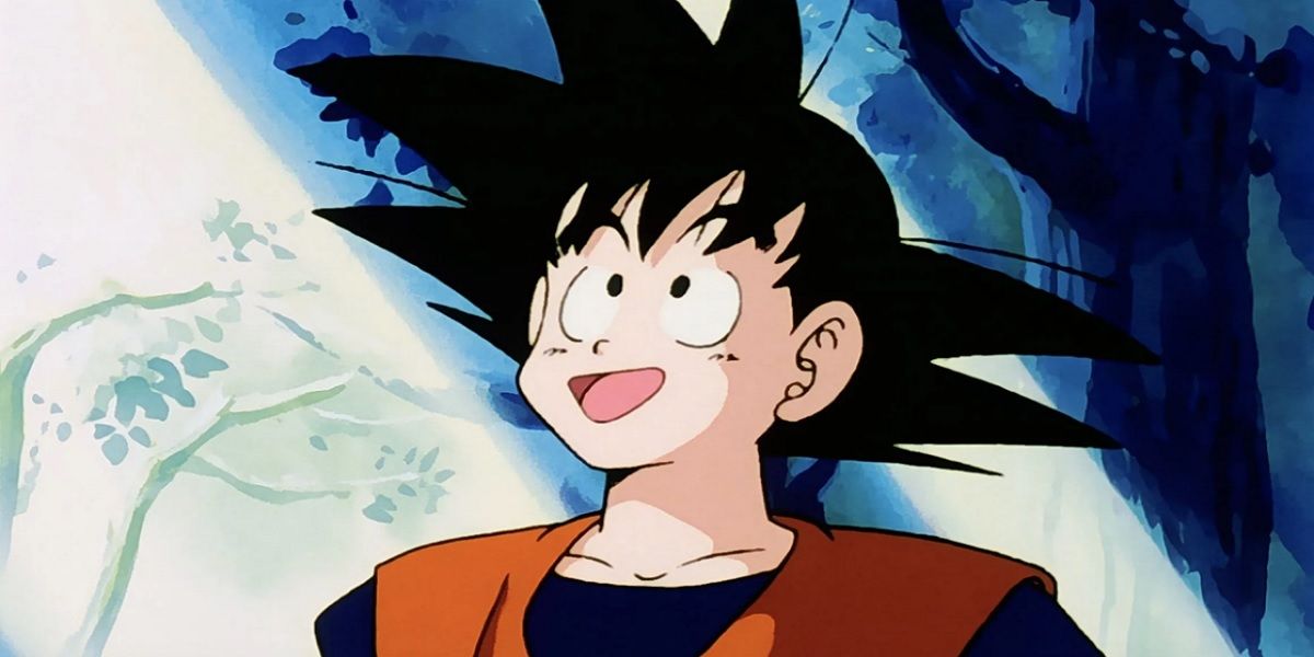 Goku looks up at a forest in Dragon Ball Z, smiling