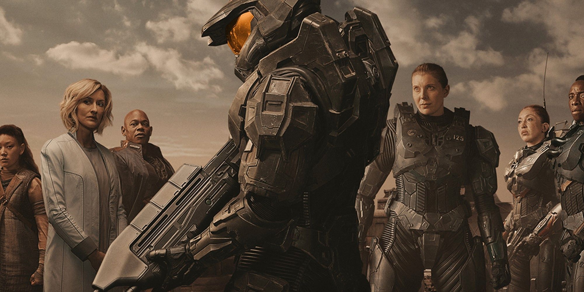 Seven characters from the Halo TV Show pose with Master Chief in the Center