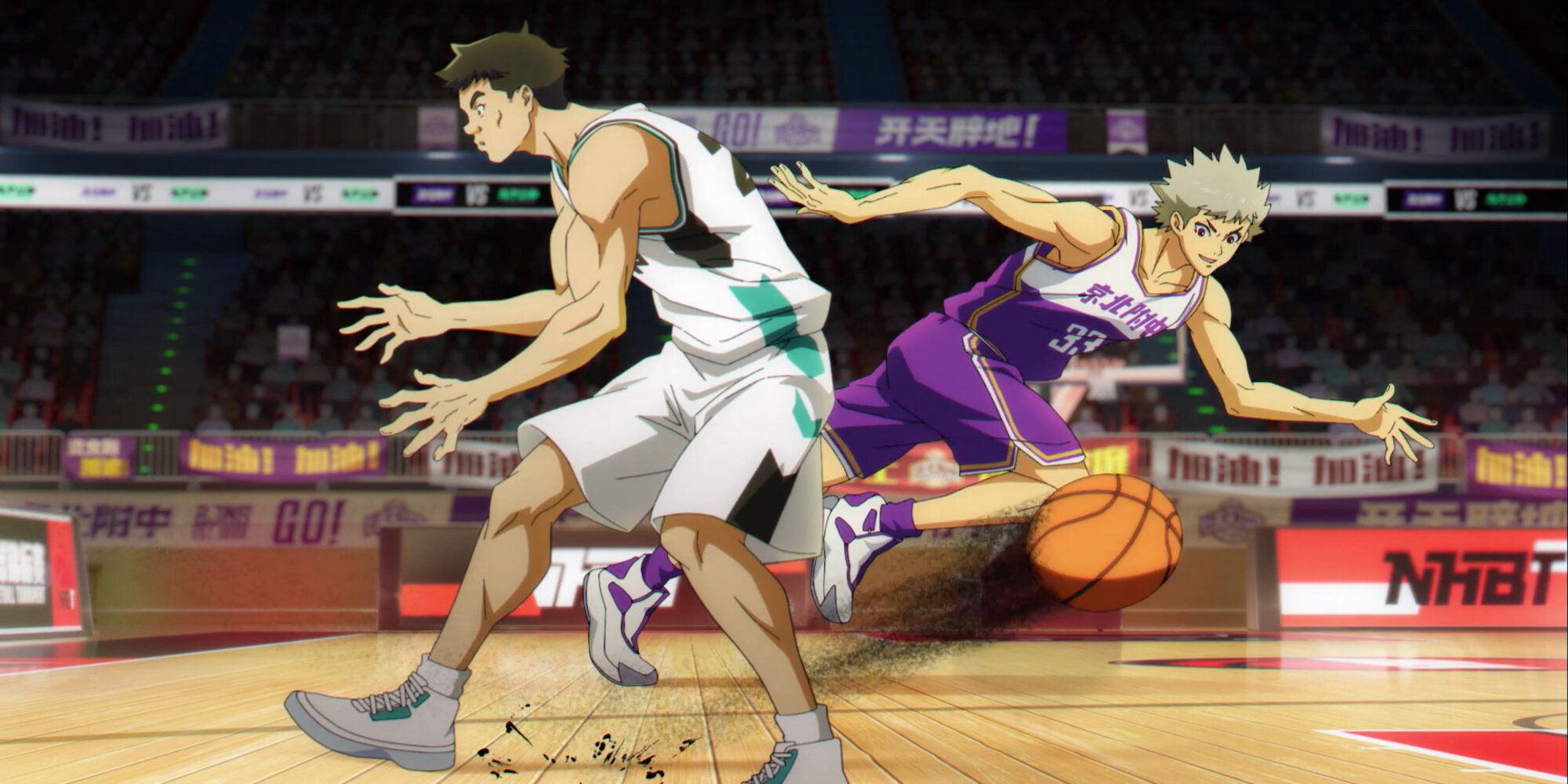 Xu Xing Ze dribbles a basketball past an opposing teammate. 
