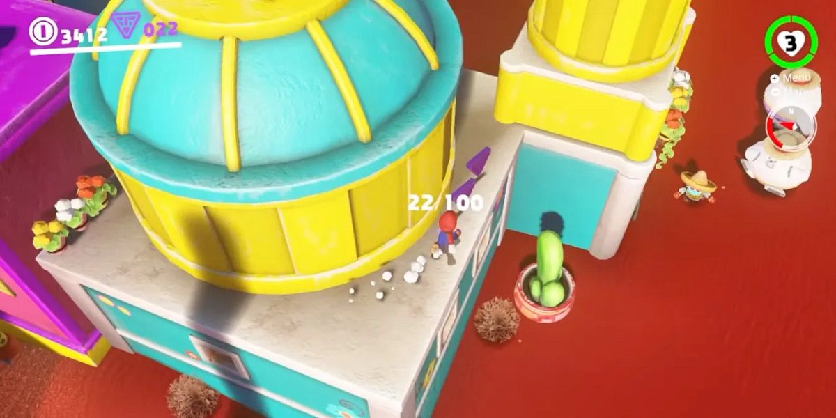 Super Mario Odyssey Sand Kingdom Mario on top of a dome-shaped building
