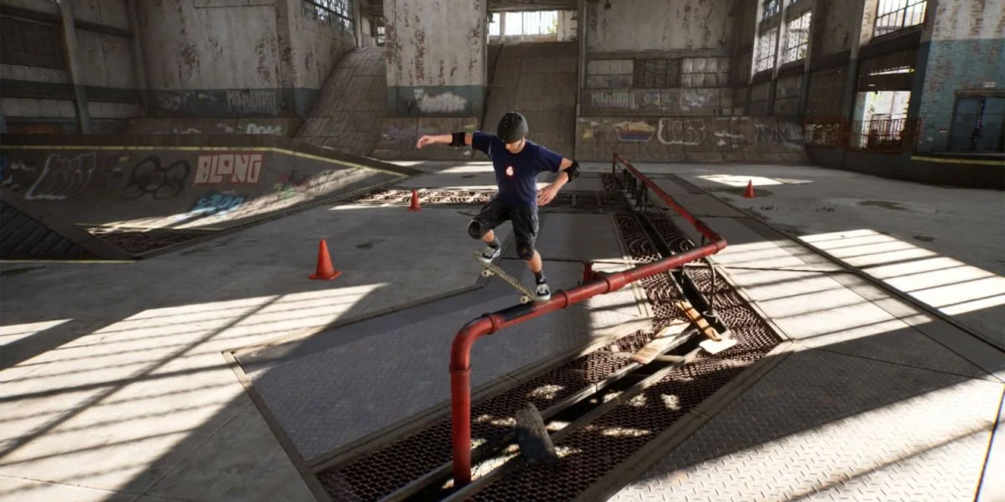 Tony Hawks Pro Skater 1 + 2 Tony Hawk grinds on a rail in the warehouse