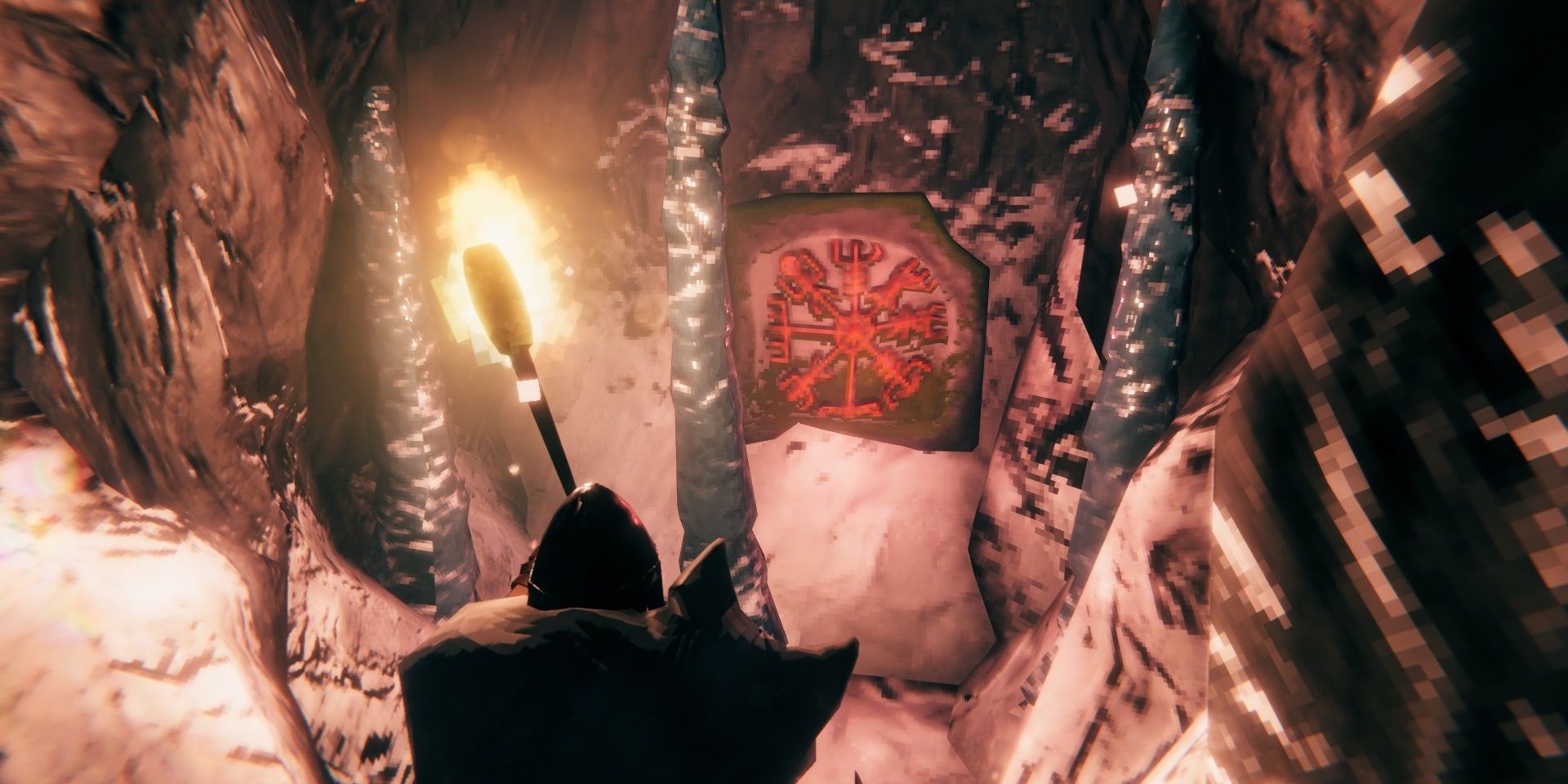 The player stares at a Moder Vegvisir in the Frost Caves.
