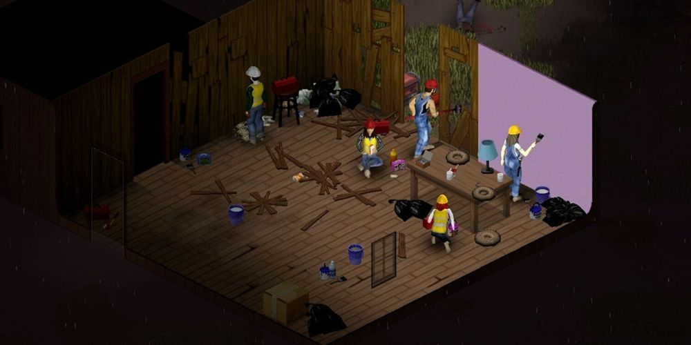 Five players build a base together, one painting the walls, with various scraps on the floor