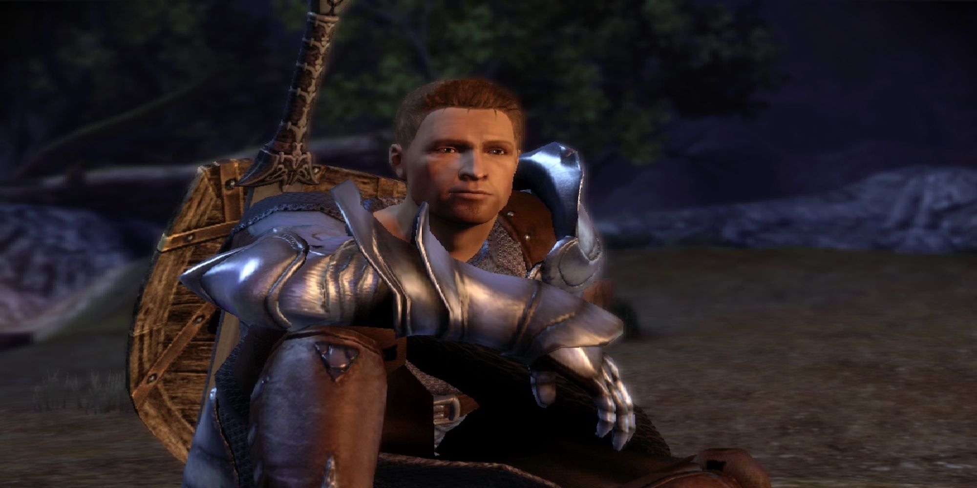 Alistair sitting down on the ground (Dragon Age: Origins)
