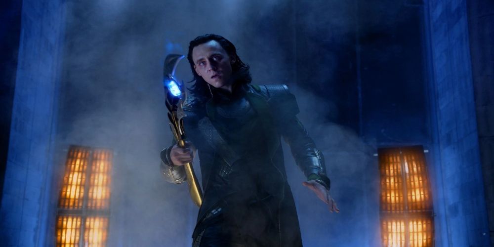Loki wielding his scepter in the first Avengers movie