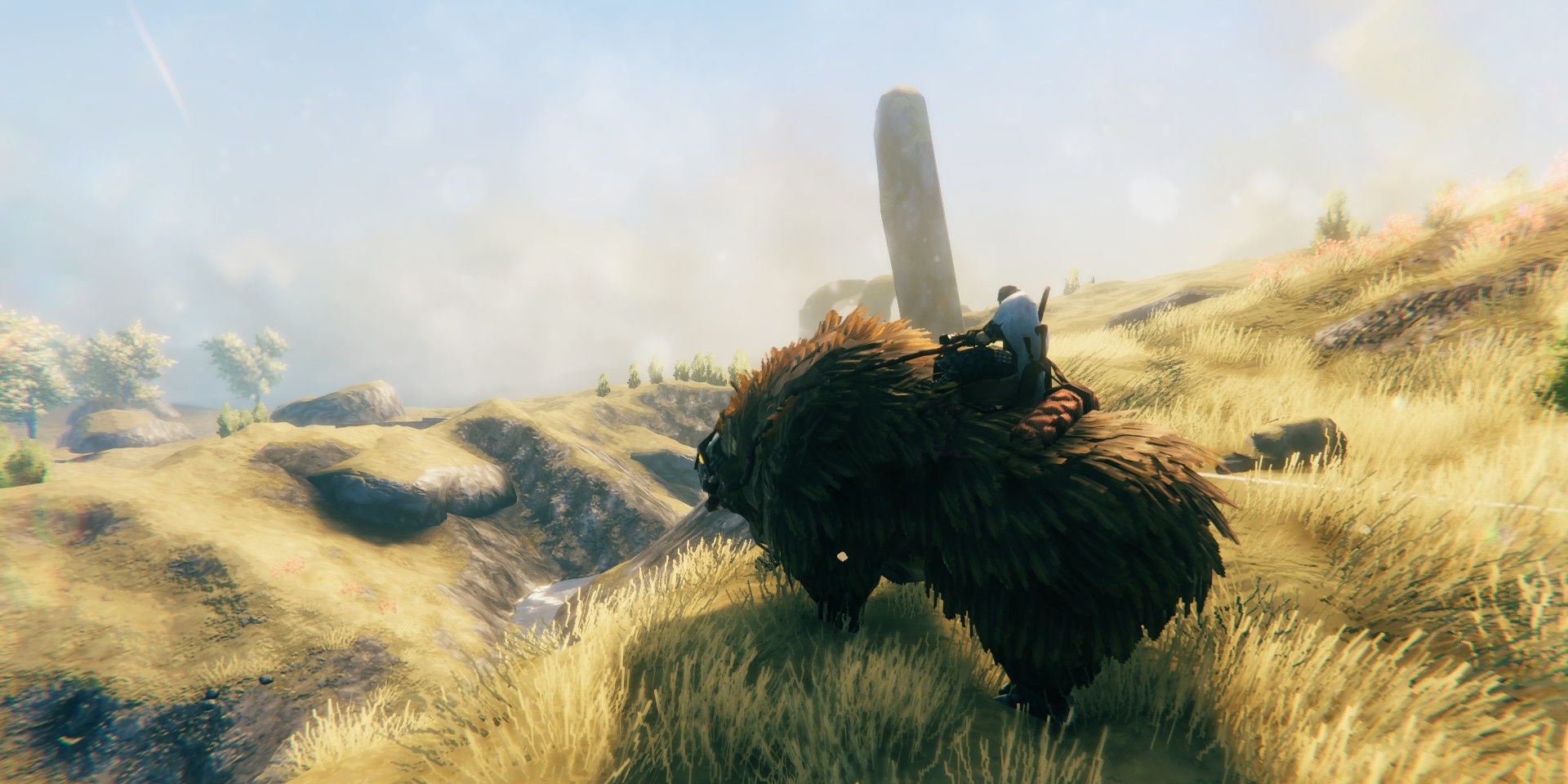 The player, riding on top of Lox, peers across the plains.