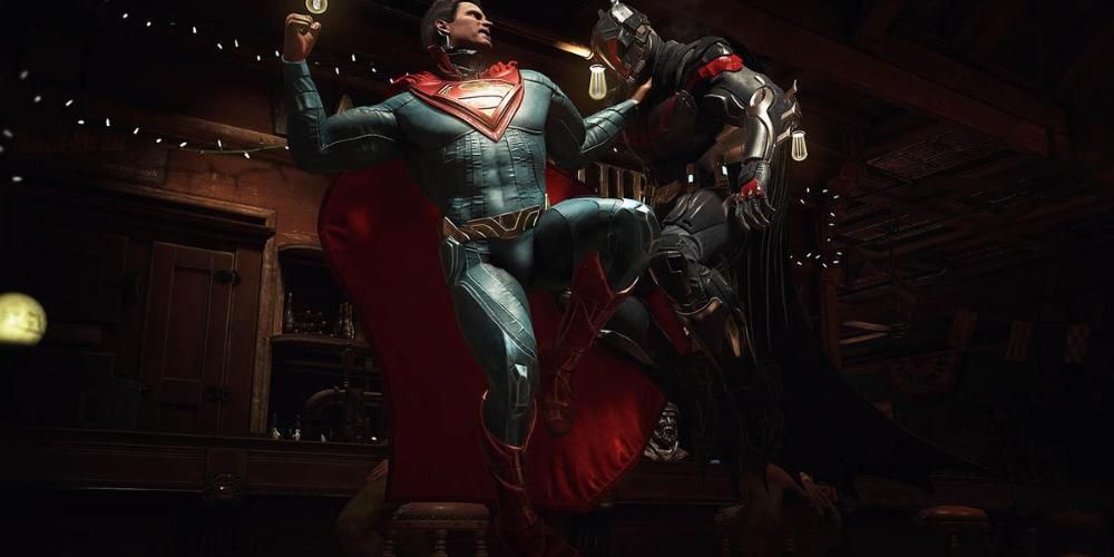 Superman holding Batman up in the air, rearing back to punch him