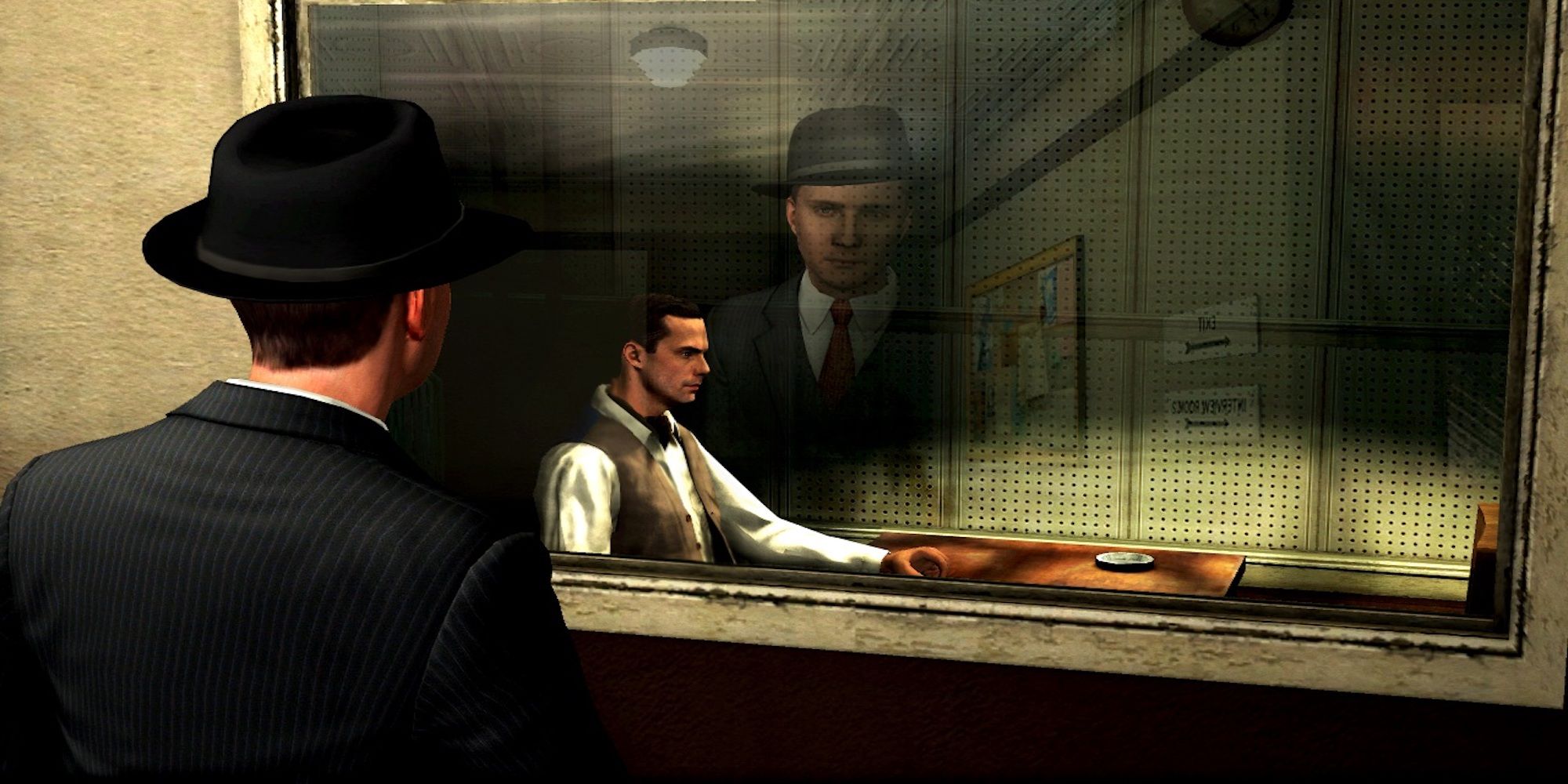 Cole watching a subject in an interrogation room (L.A. Noire)