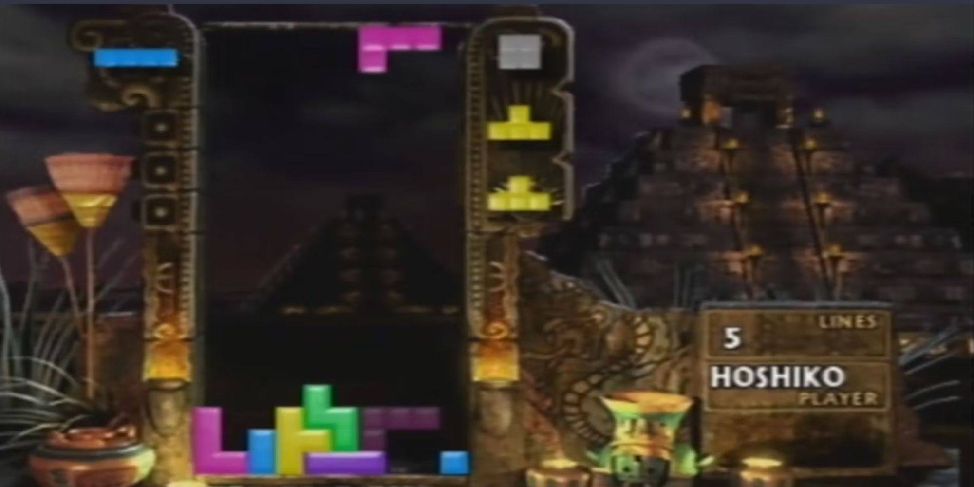 The New Tetris on Nintendo 64 dropping pink L-Block with a grey Square Block as the next block