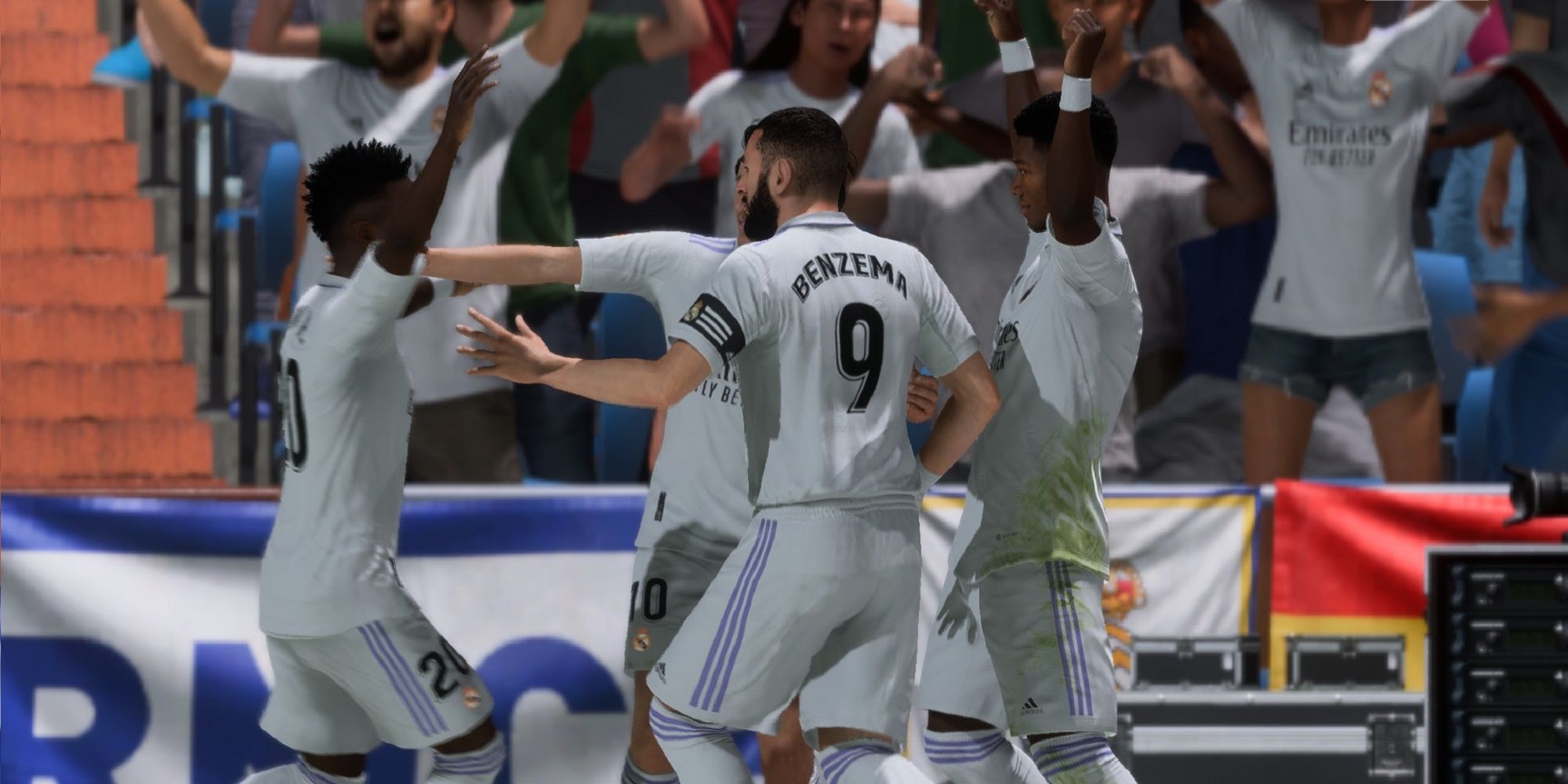 FIFA 23 Karim Benzema and teammates celebrating on the pitch