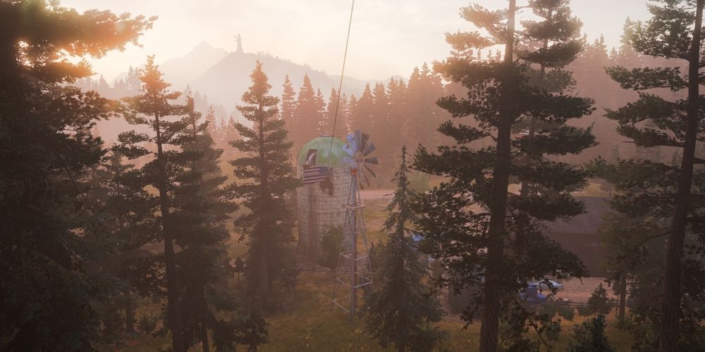 Far Cry 5 tall building among trees