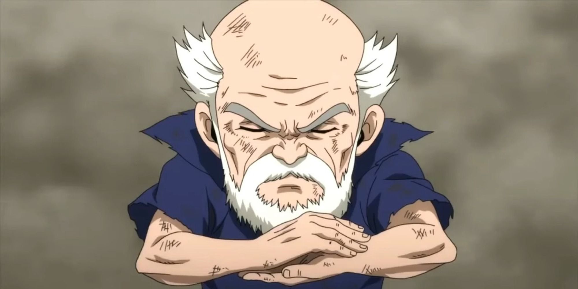 Makarov Dreyar of Fairy Tail frowning with palms together