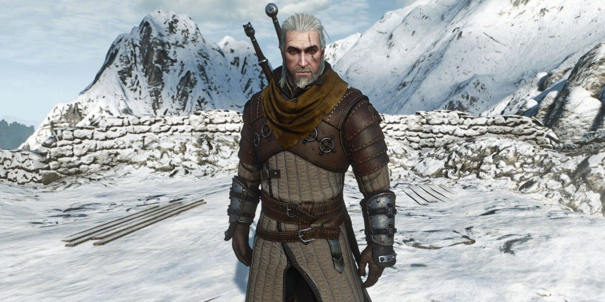 Geralt wears the not yet upgraded Bear School gear high in the mountains