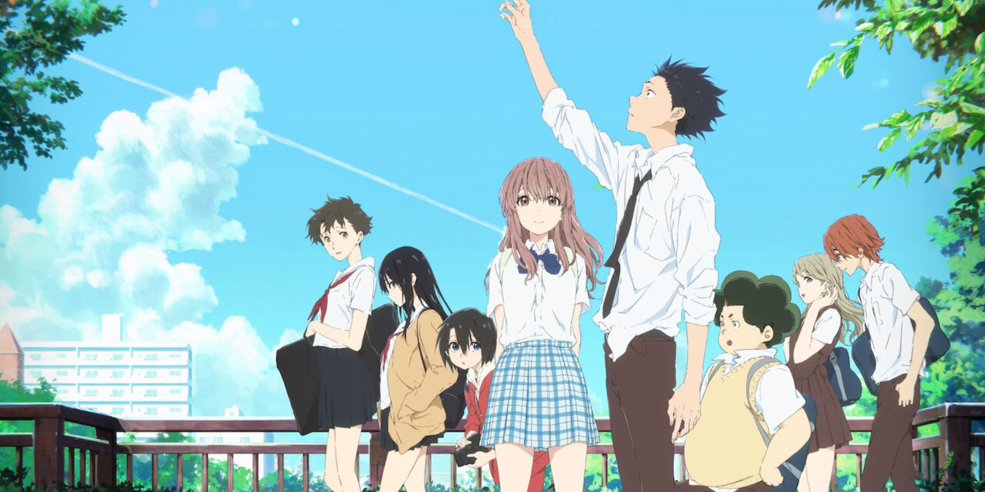 A Silent Voice cast members stand outdoors