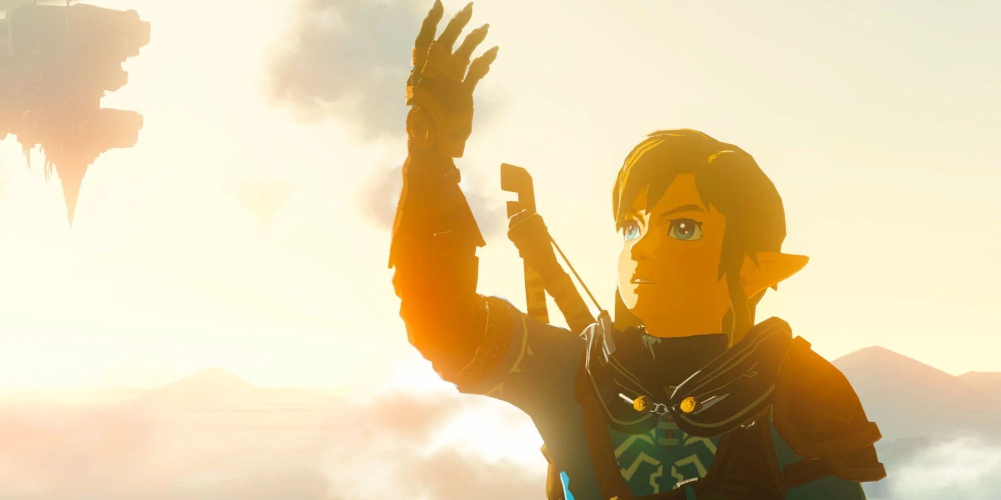 Link holds his corrupt arm above his head in the sunlight in The Legend of Zelda Tears of the Kingdom