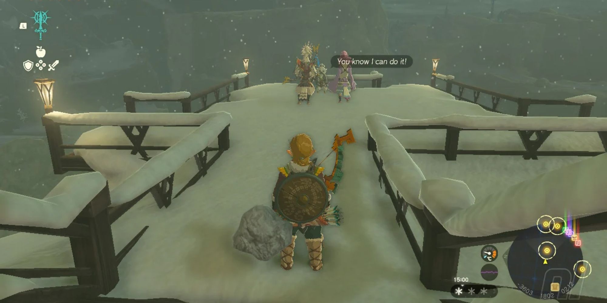 Link stands on a snow-covered lookout point behind Teba in Rito Village Tears of the Kingdom