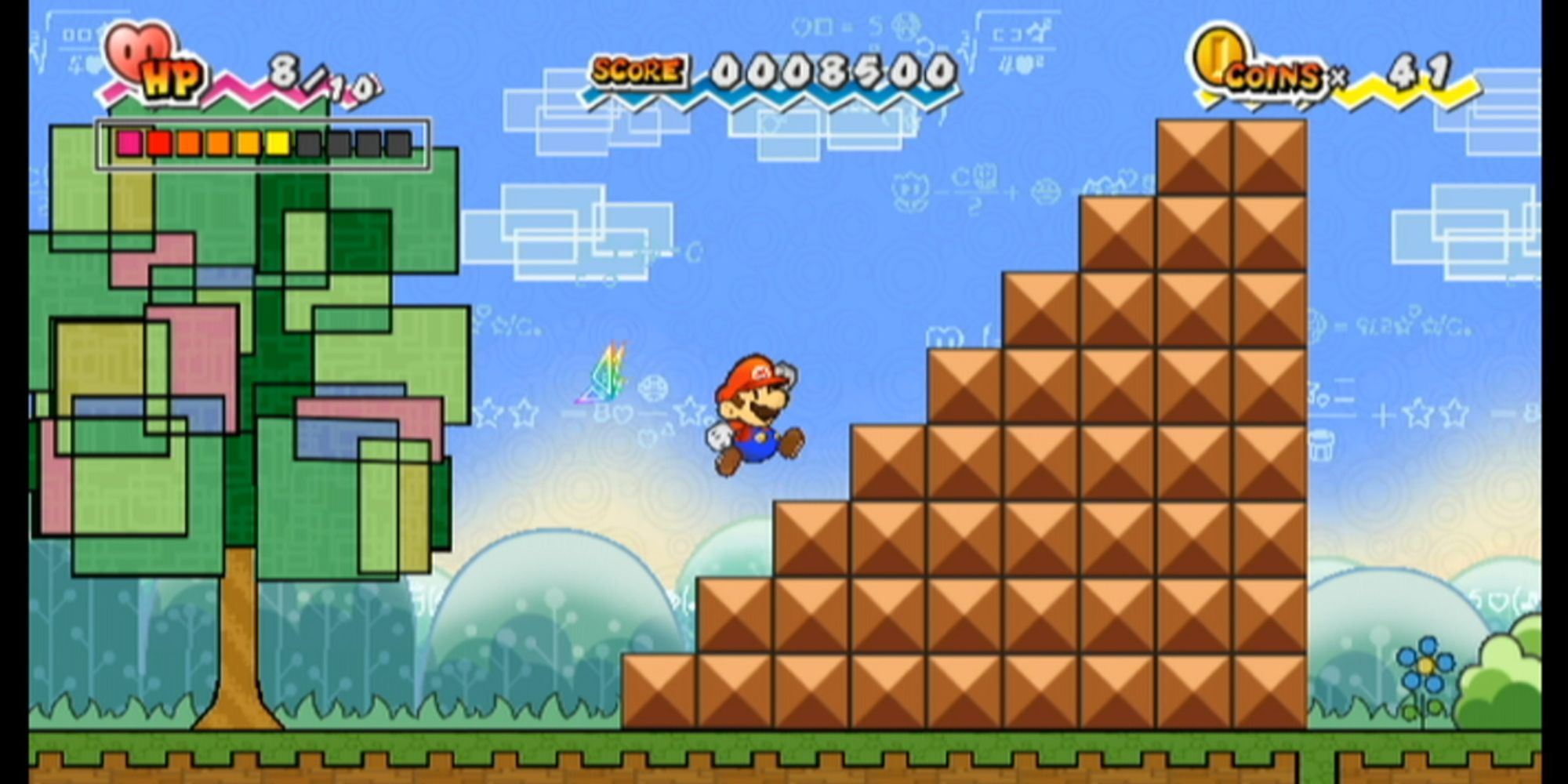 Mario runs on a level of brown blocks next to a geometric tree in Super Paper Mario