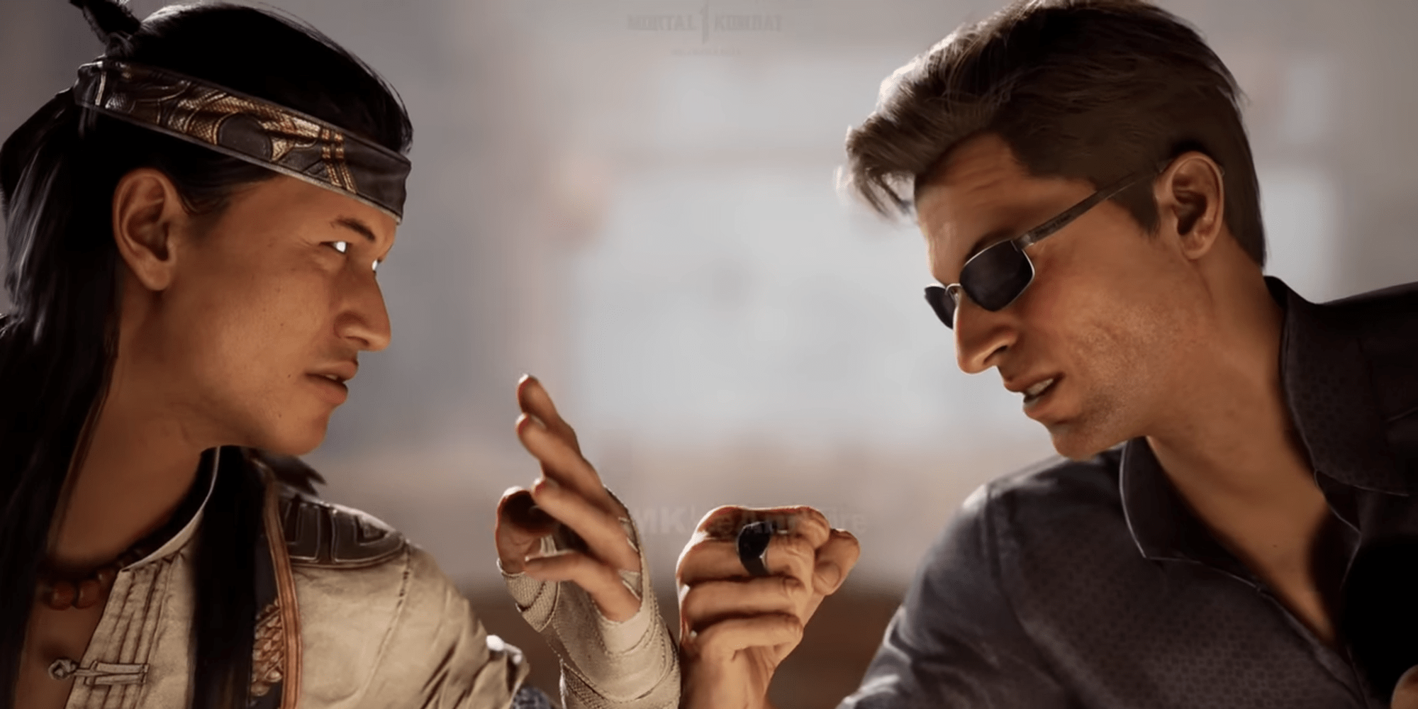 Liu Kang and Johnny Cage clashing fists before battle in Mortal Kombat 1.