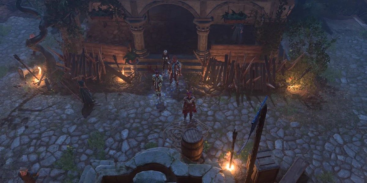 Players outside the Last Light Inn in Baldur's Gate 3.