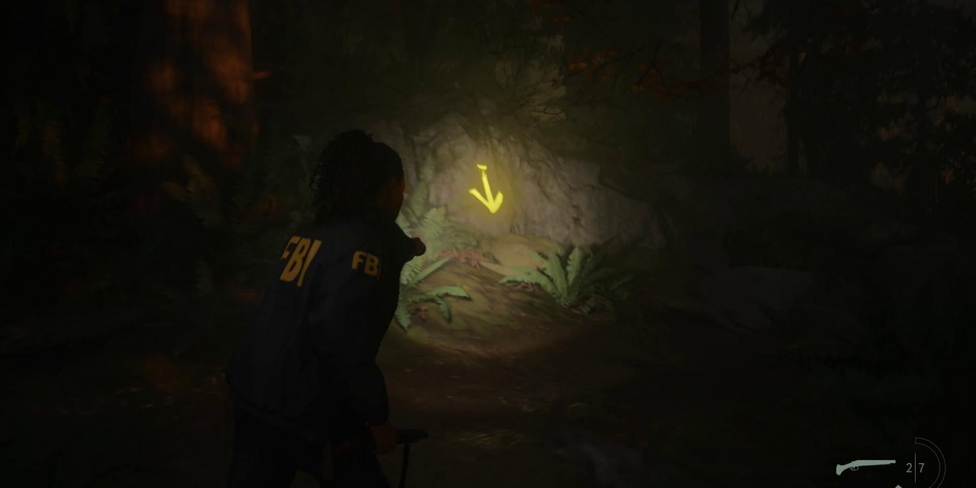 Pfeil markiert Streamside Stash Key in Alan Wake 2