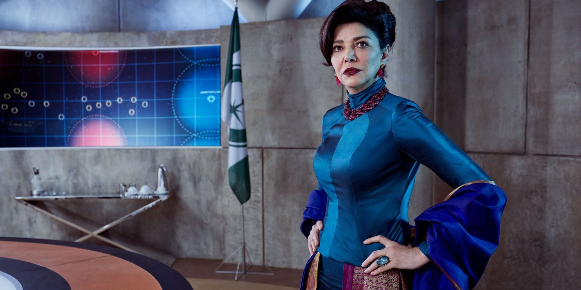 Still of Shohreh Aghdashloo wearing a shiny blue dress in Renfield