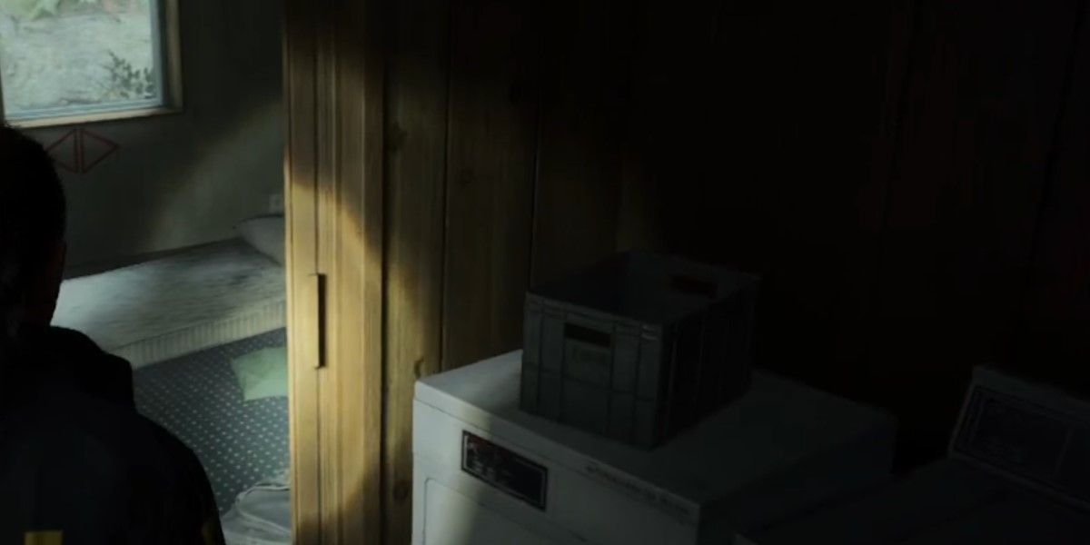 The Alan Wake 2 found the final symbol above the bed needed to unlock the box outside. 