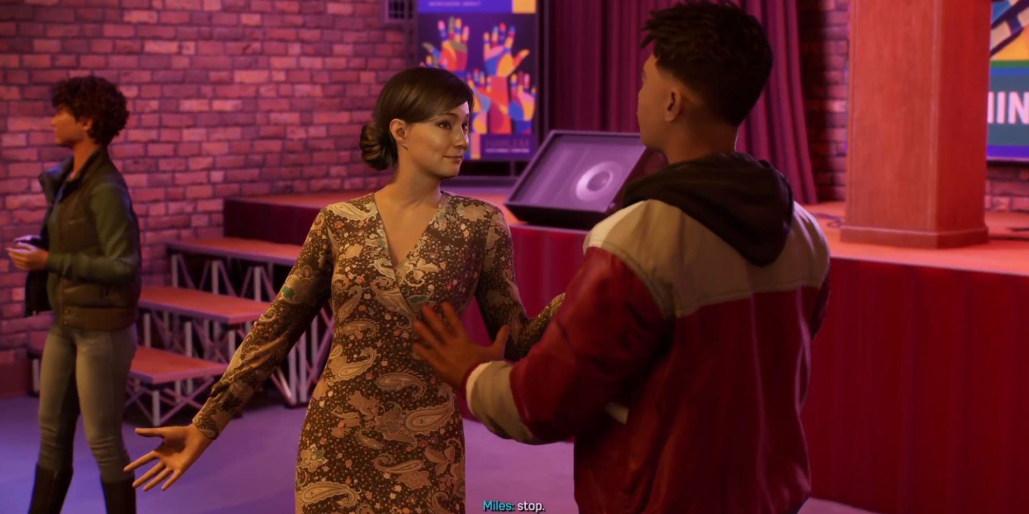 Still of Rio Morales holding out her arms on the dancefloor opposite Miles in Spider-Man 2