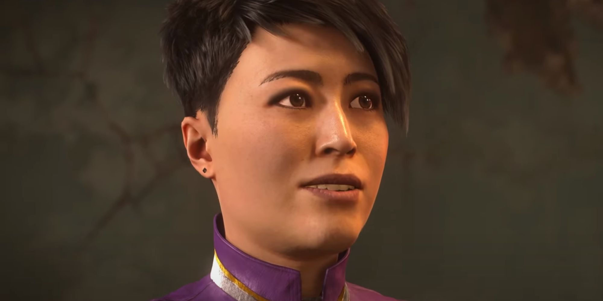 Still of a short-haired Yuri wearing a purple and gold suit while smiling in Spider-Man 2