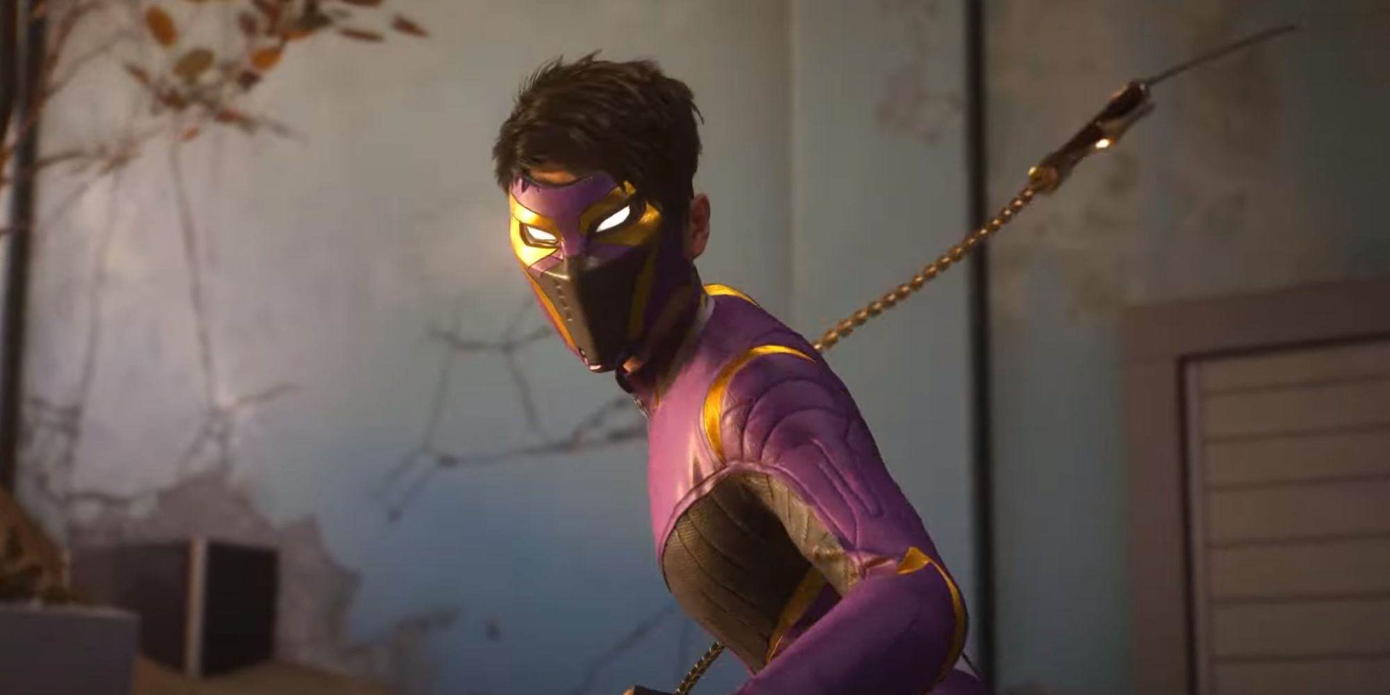 Still of Wraith wearing a purple and gold mask swinging a bladed chain in Spider-Man 2