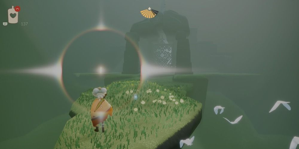 A Hidden Forest Winged Light standing to the side of a fence in the Underground Cavern in Sky: Children of the Light.