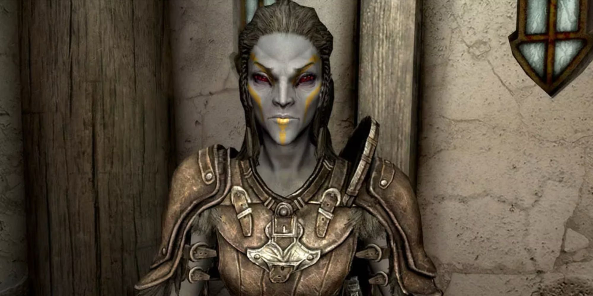 Jenassa looking at the player. A dark elf, wearing an armour