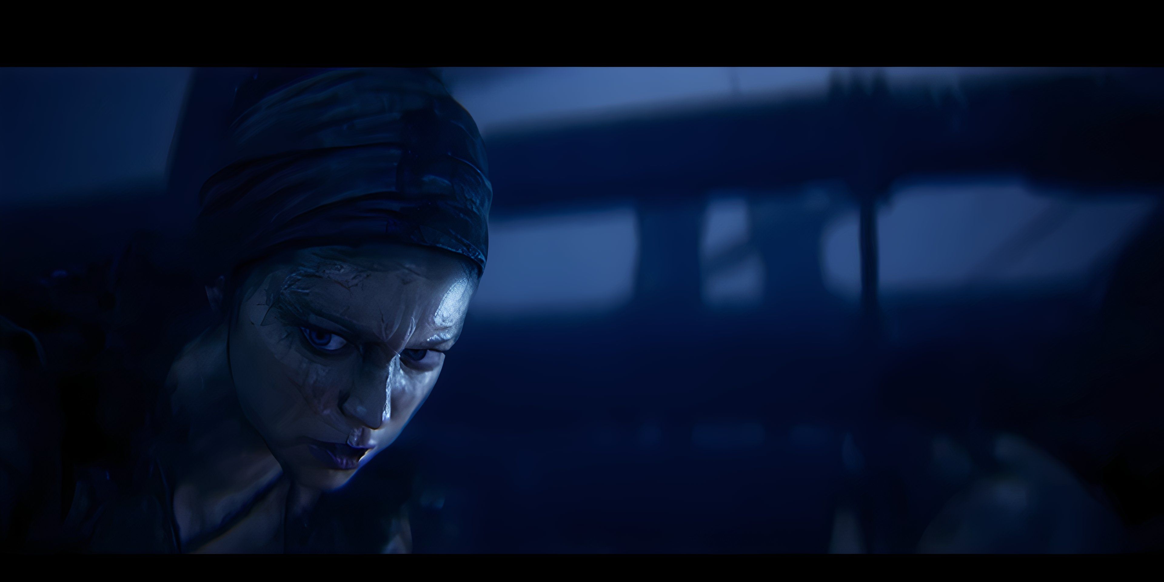 Senua listens to the voices in Hellblade 2